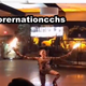 Fire-eaters are shown performing in front of a tiger’s cage at Christopher Columbus High School’s jungle-themed prom.